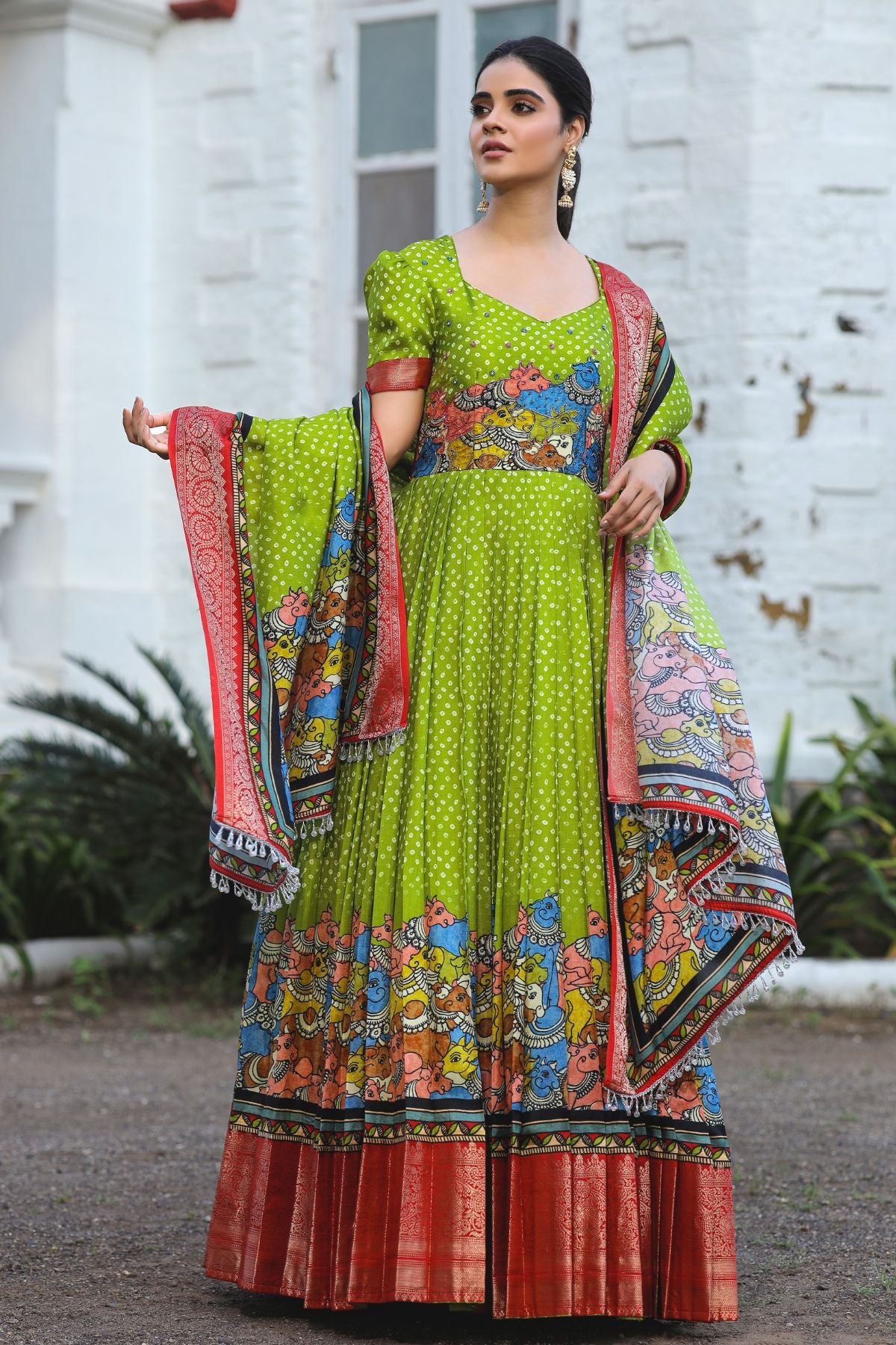 Stylish lime Bandhej Banarasi dress with red accents