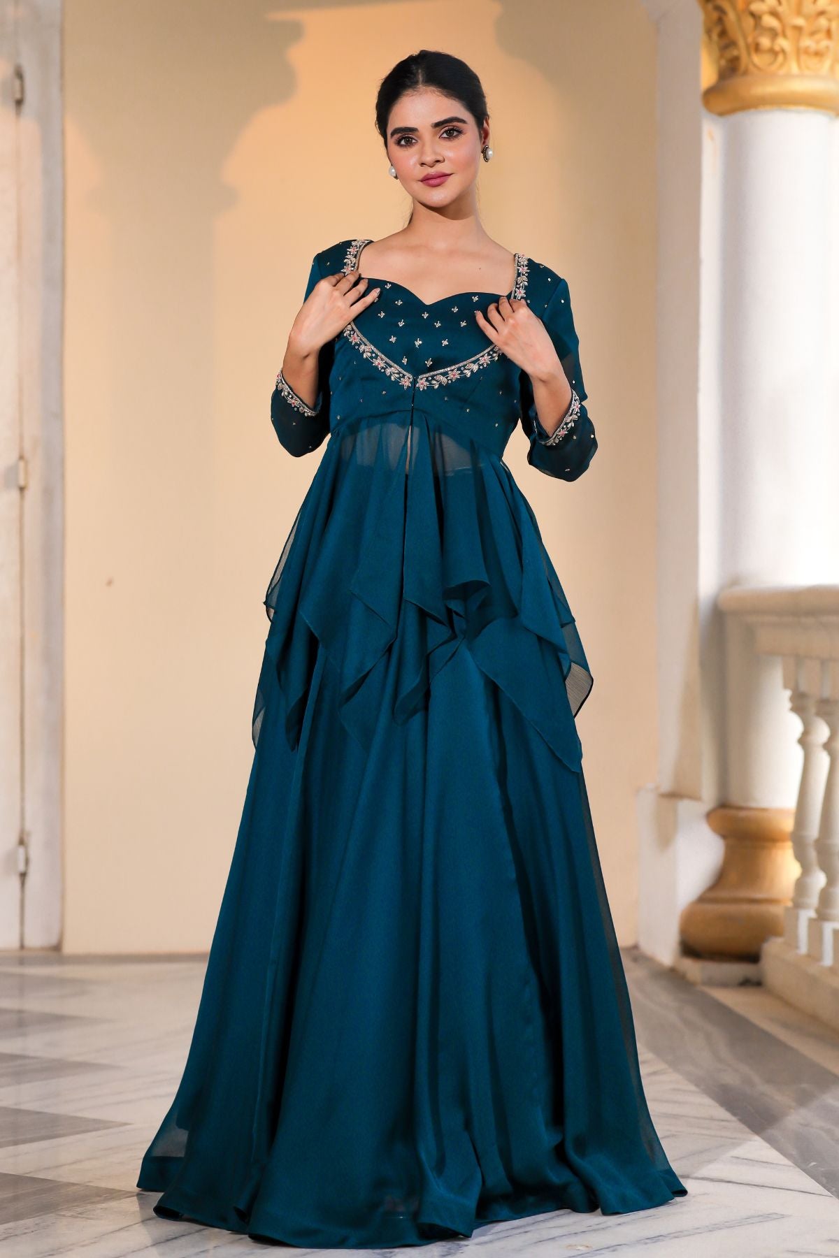 Full-length Peacock Majesty dress with elegant draping