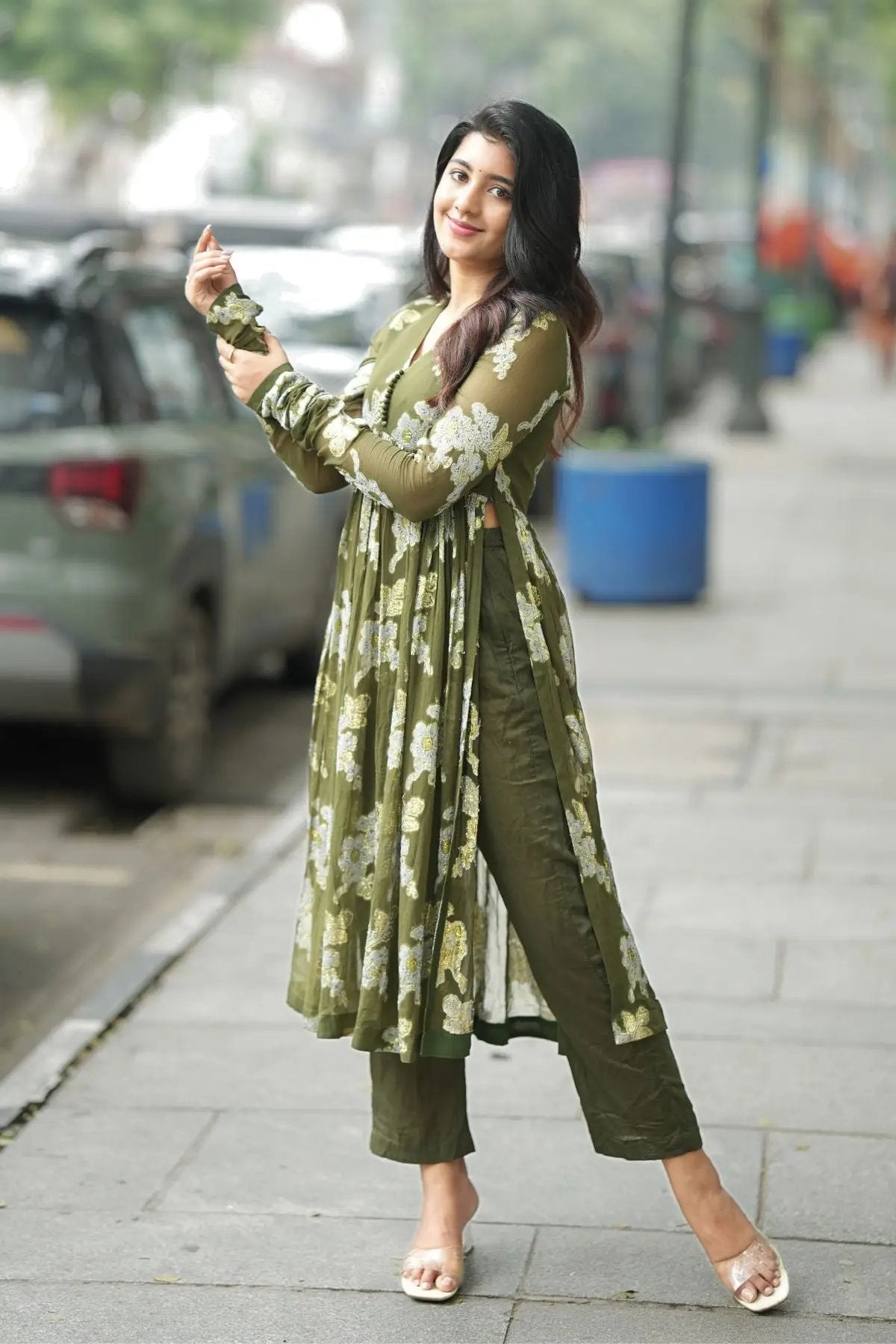 Side view of the Maahi Kurta Set in Olive with a flared silhouette and matching pants, ideal for festive and ceremonial wear.