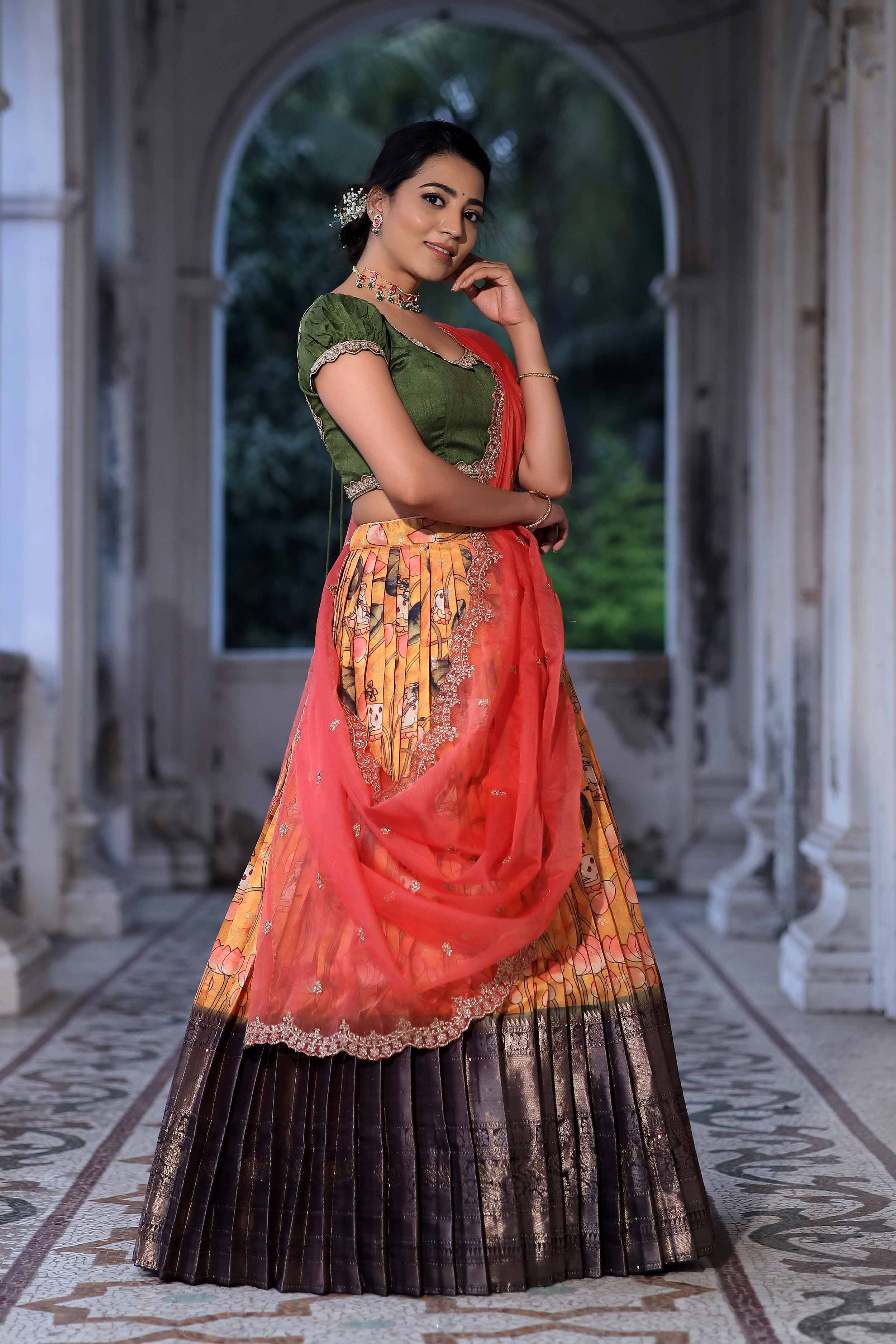 a woman in mehndi green anarakli suit