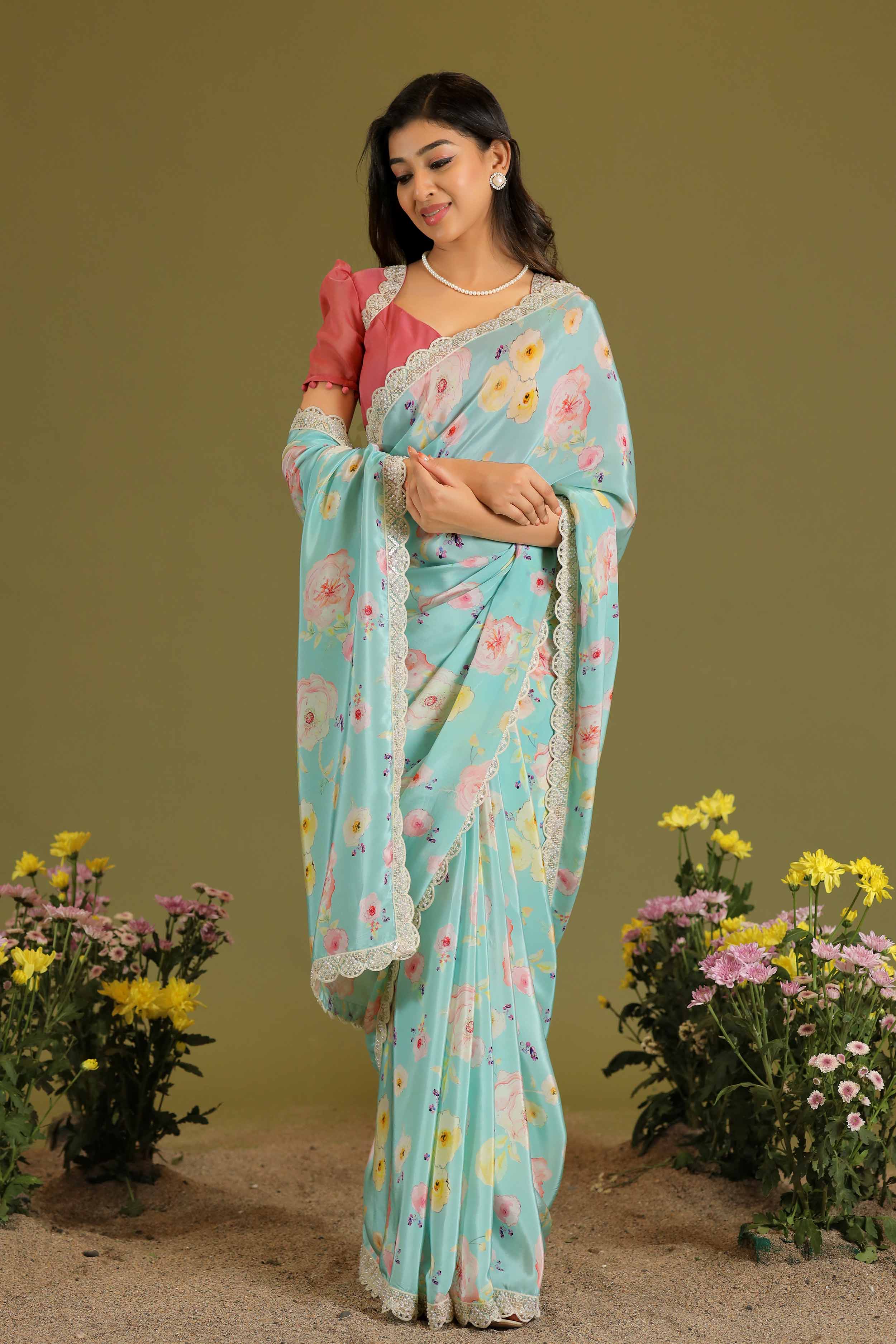 a woman in pink and blue Retro Prints Saree - Bullionknot