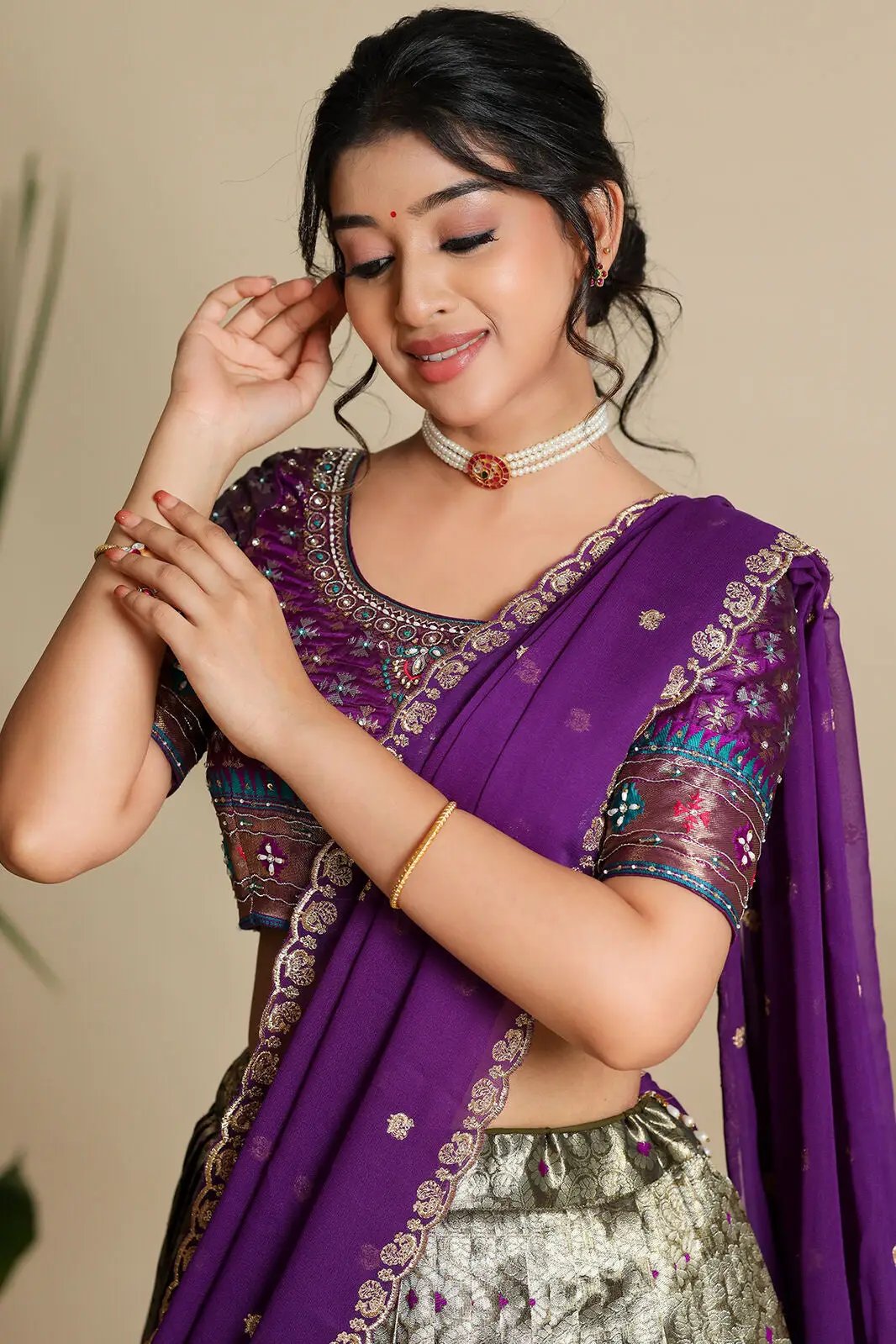 Model wearing Shreshtha purple lehenga, detailed blouse