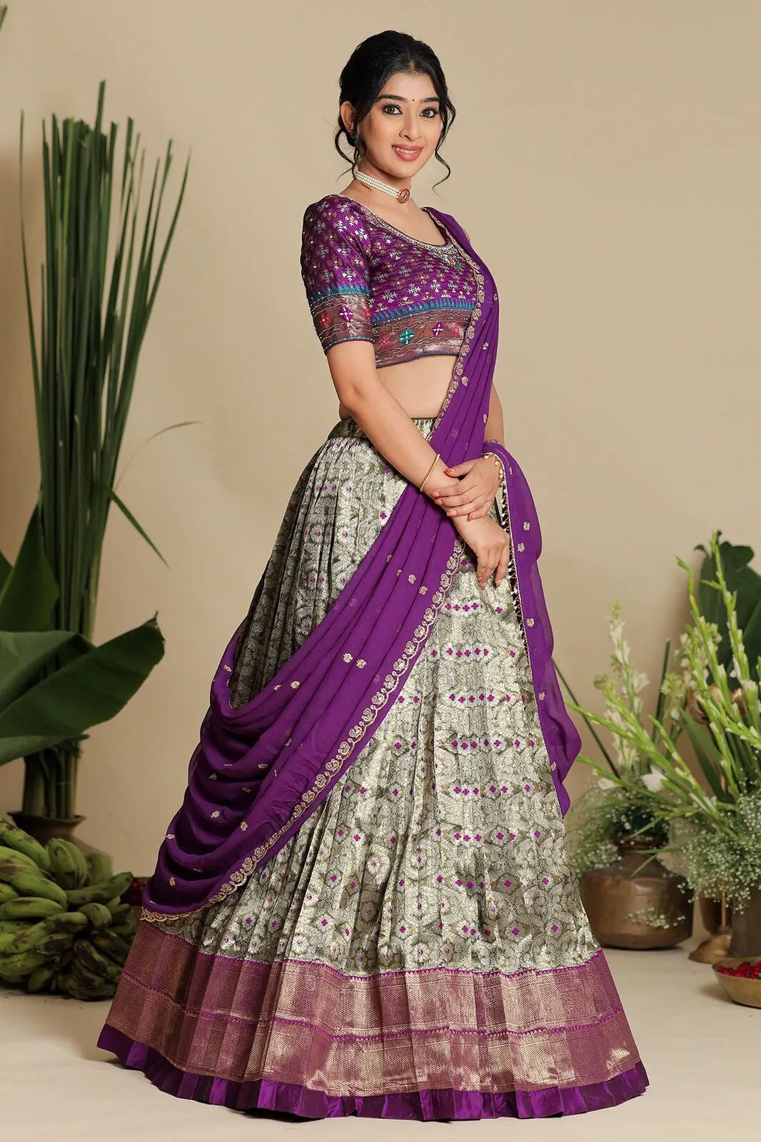 Side view of Shreshtha purple half saree lehenga set