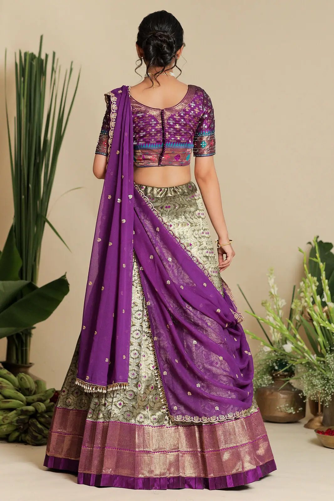 Back view of Shreshtha purple half saree lehenga set