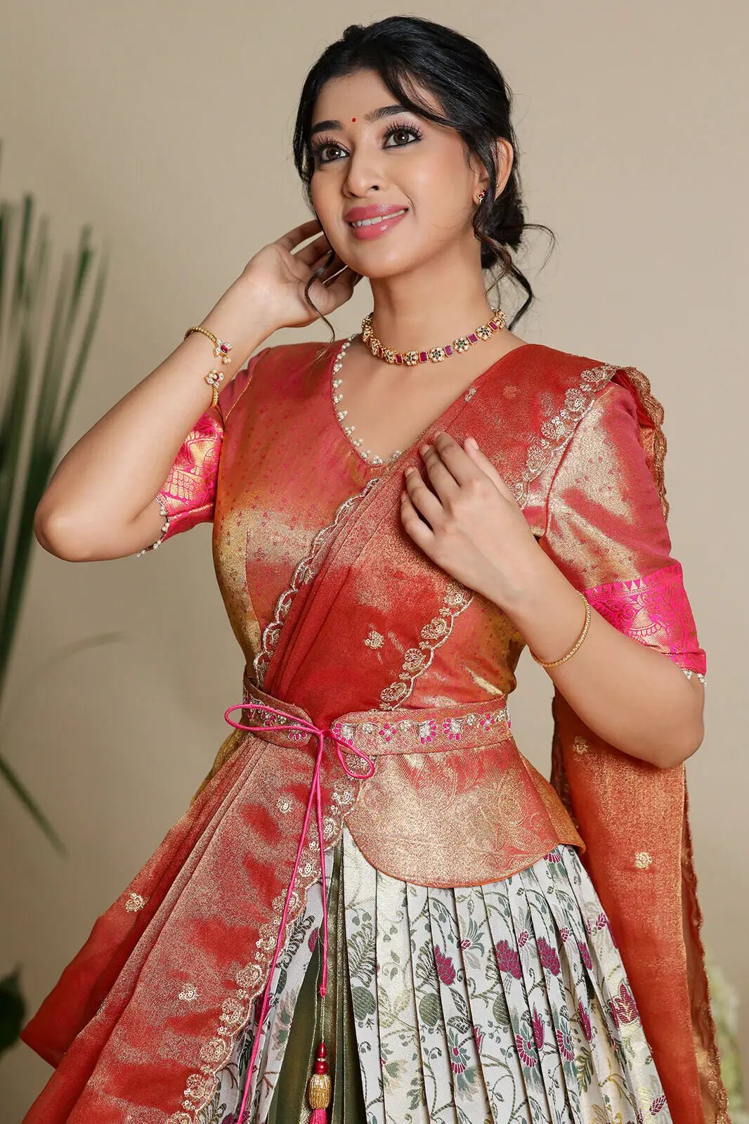 Close-up of ivory lehenga set with intricate embroidery