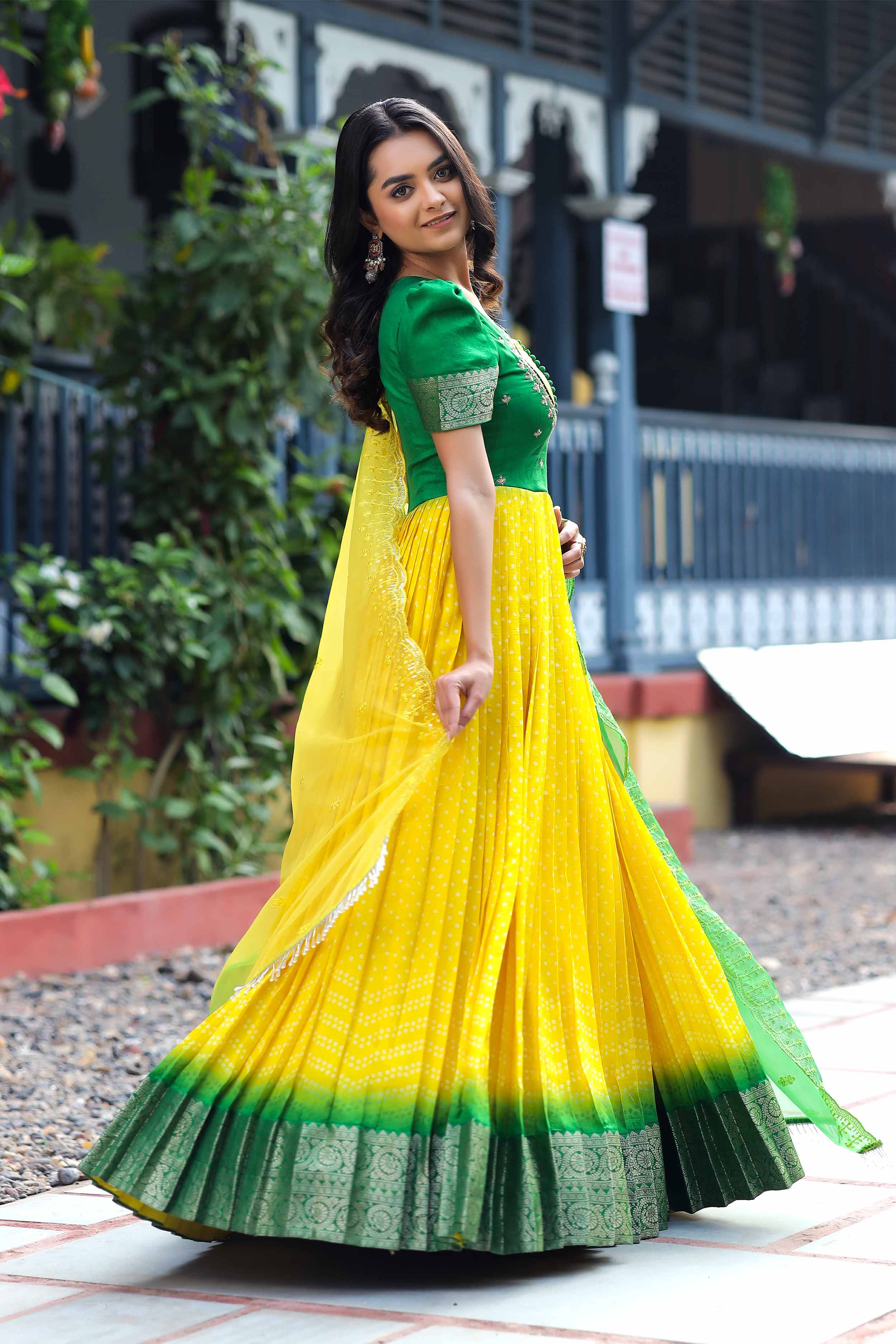 a woman in Bandhani Anarkali Dress