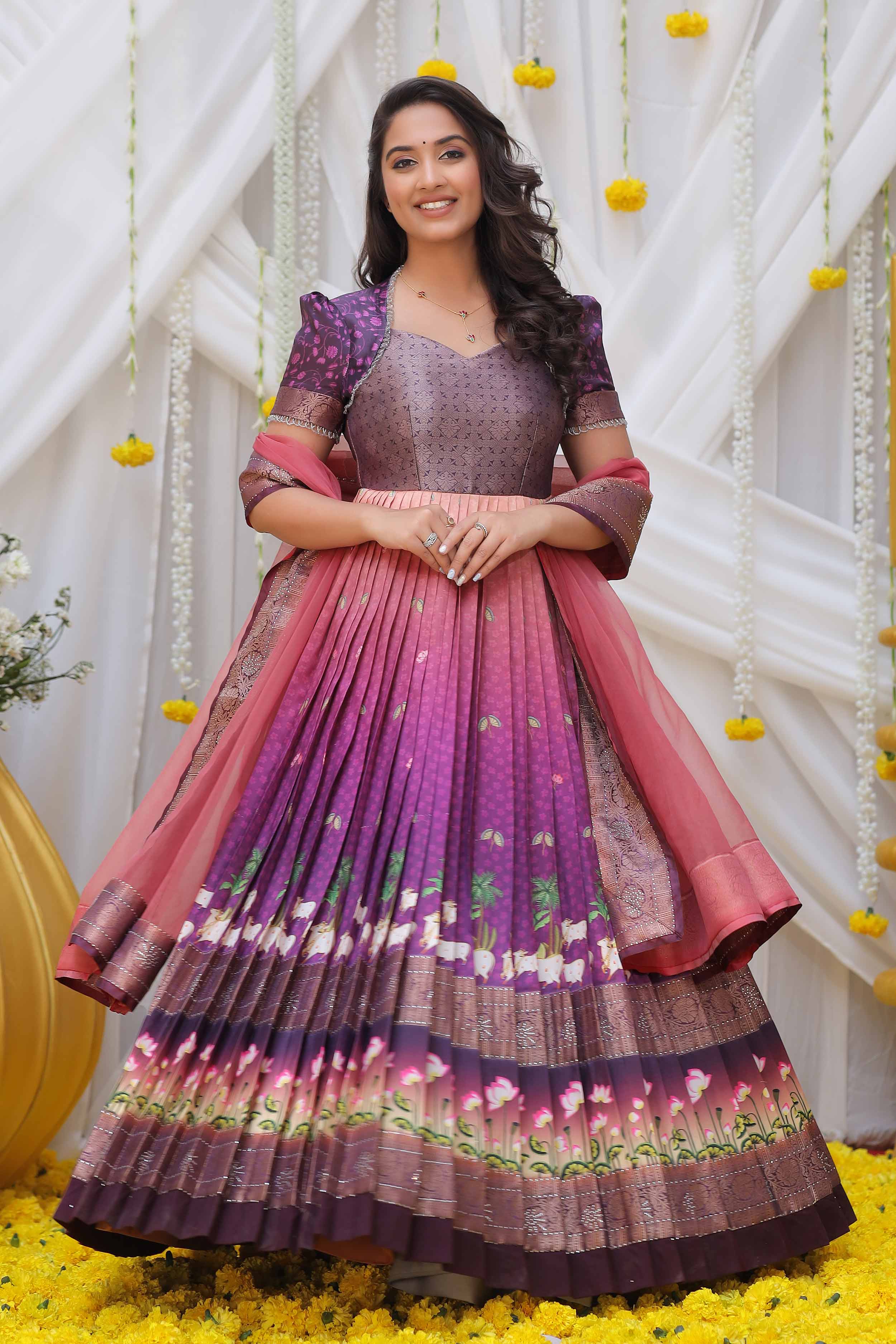a woman in purple peach Banarasi Dress