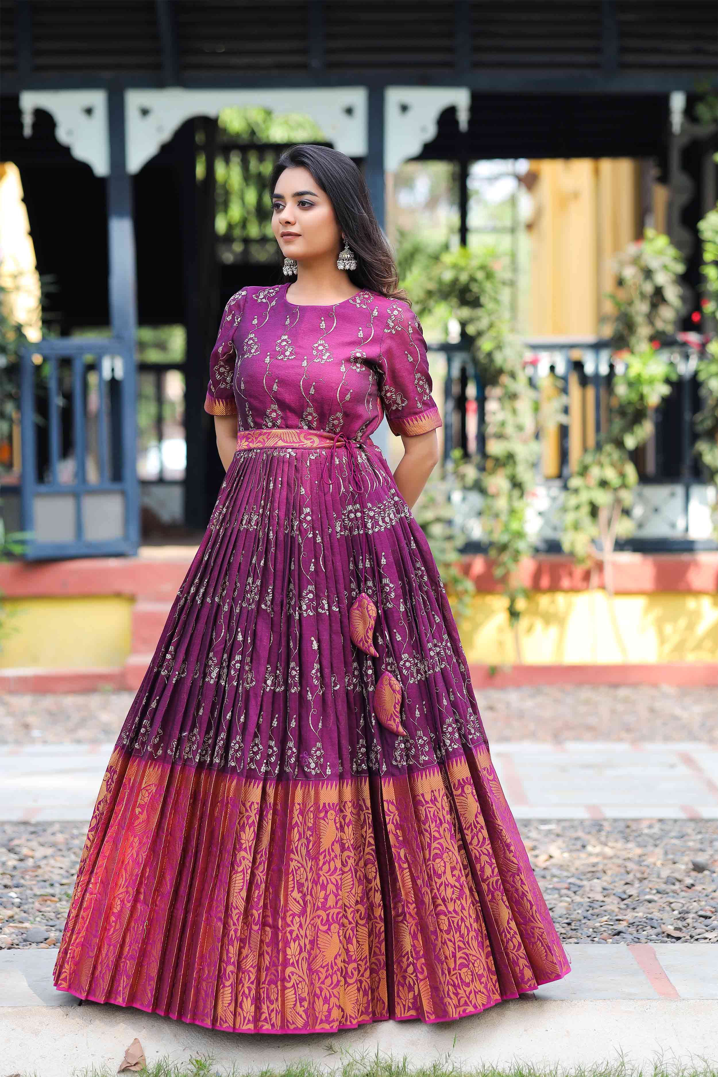 a woman in red handloom dress