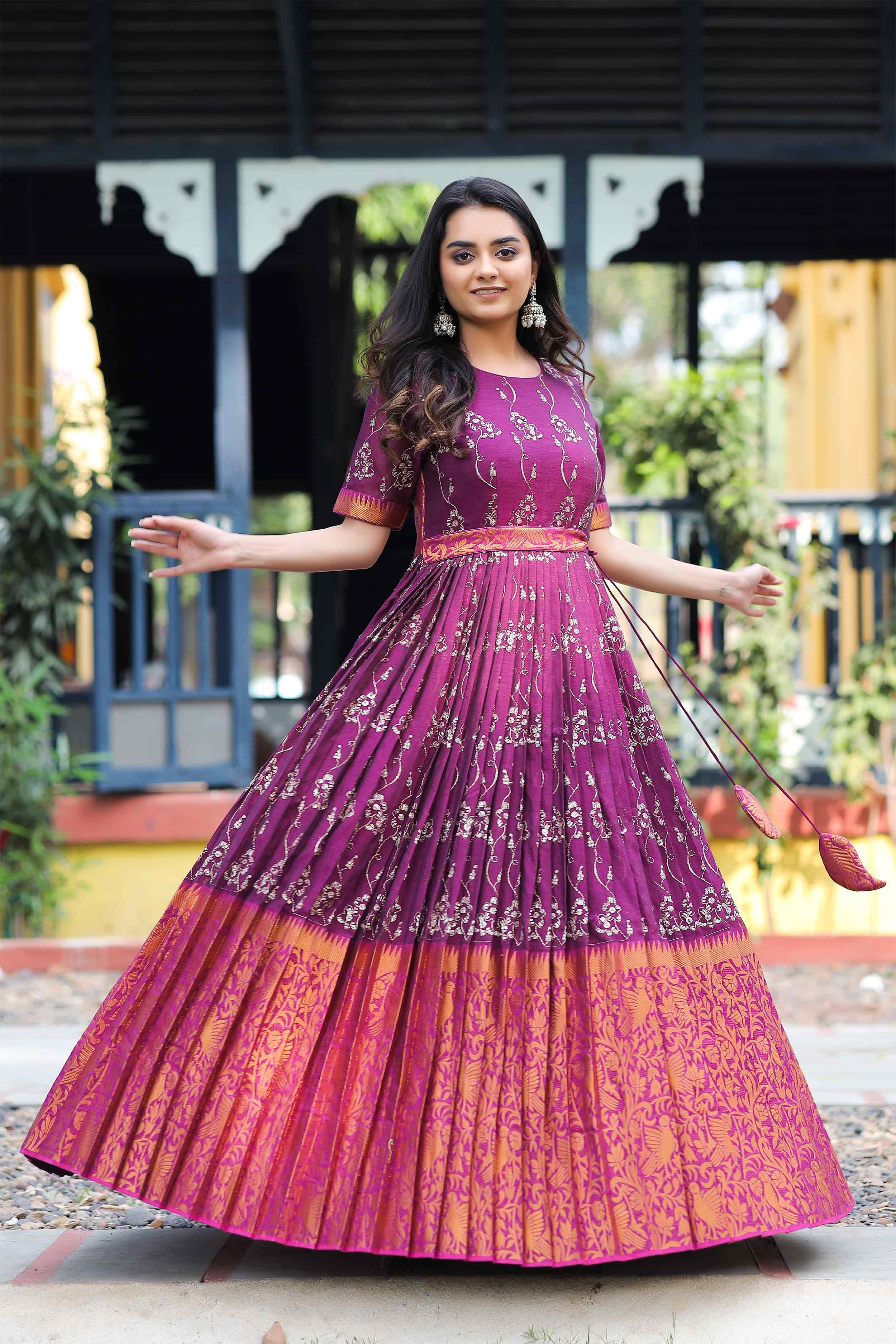 a woman in pink handloom dress