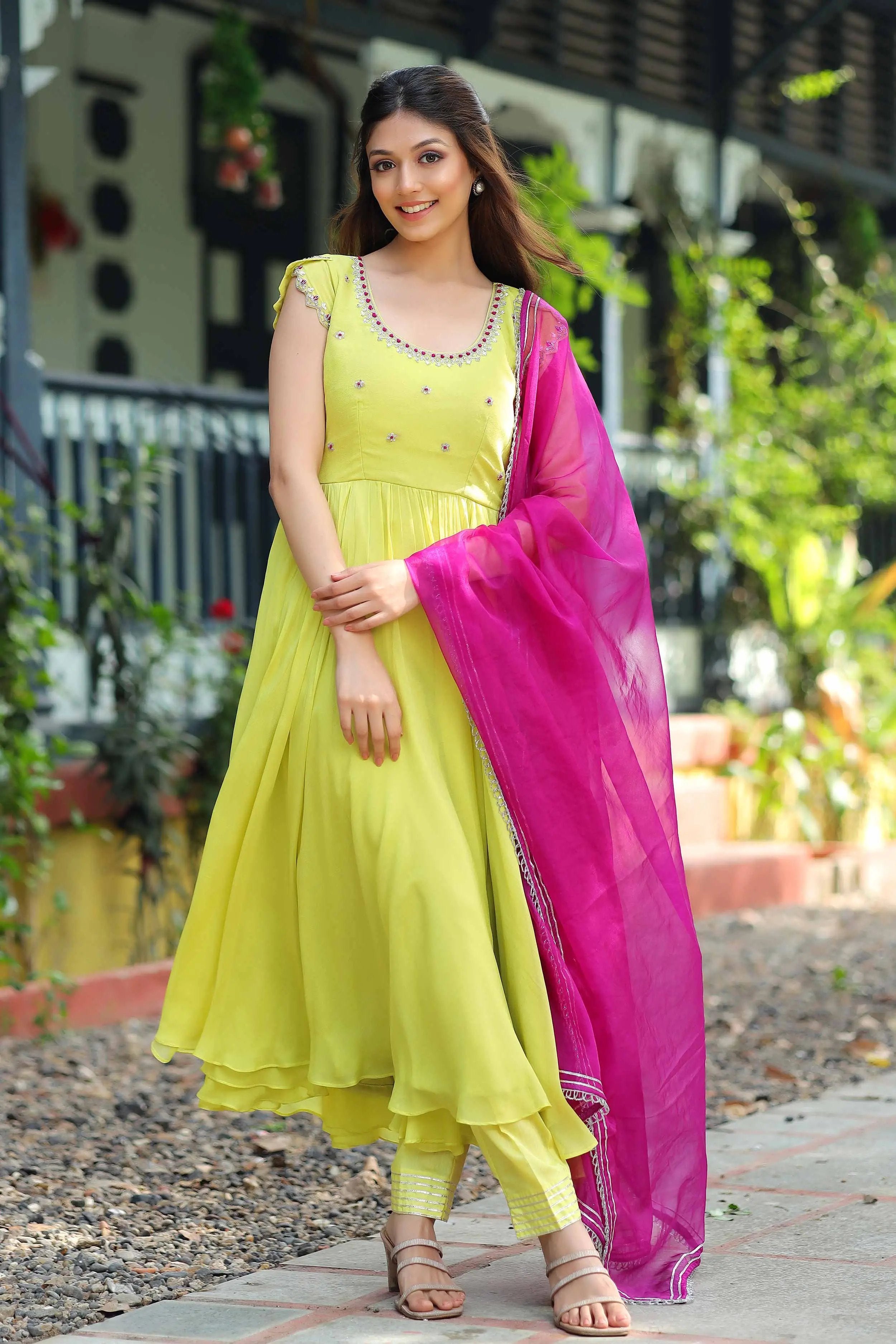 a woman in lemon yellow Tulip Anarkali Suit Set With Pent - Bullionknot