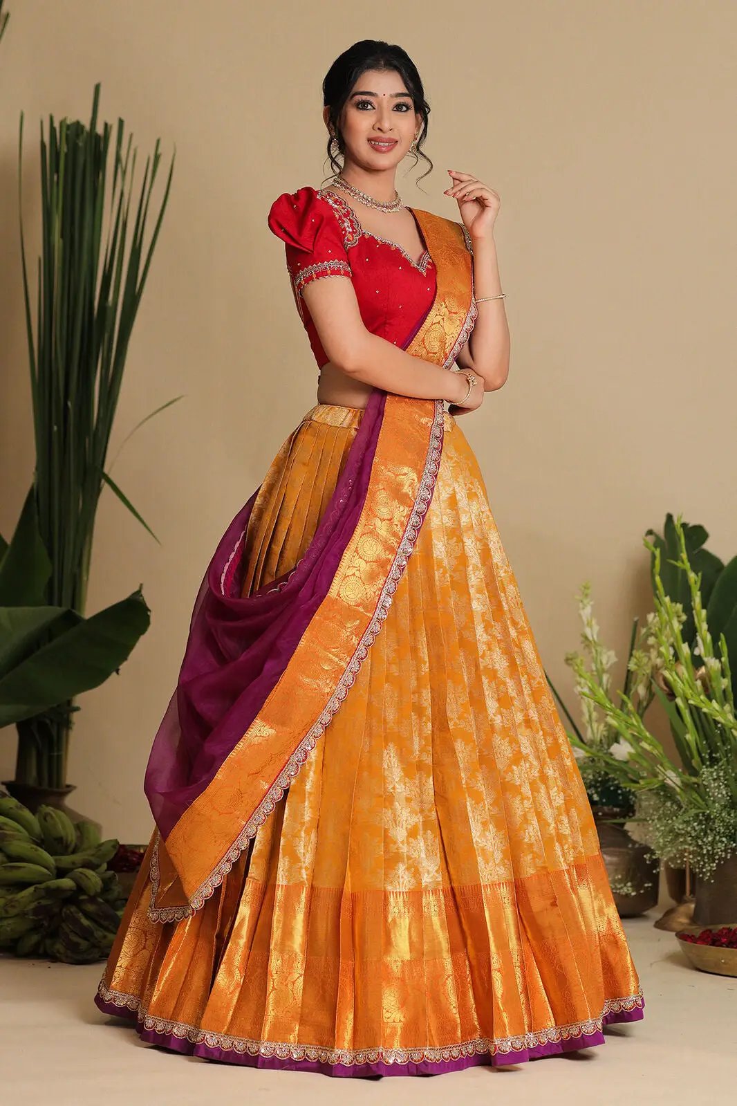 Twisha traditional half saree in red and orange