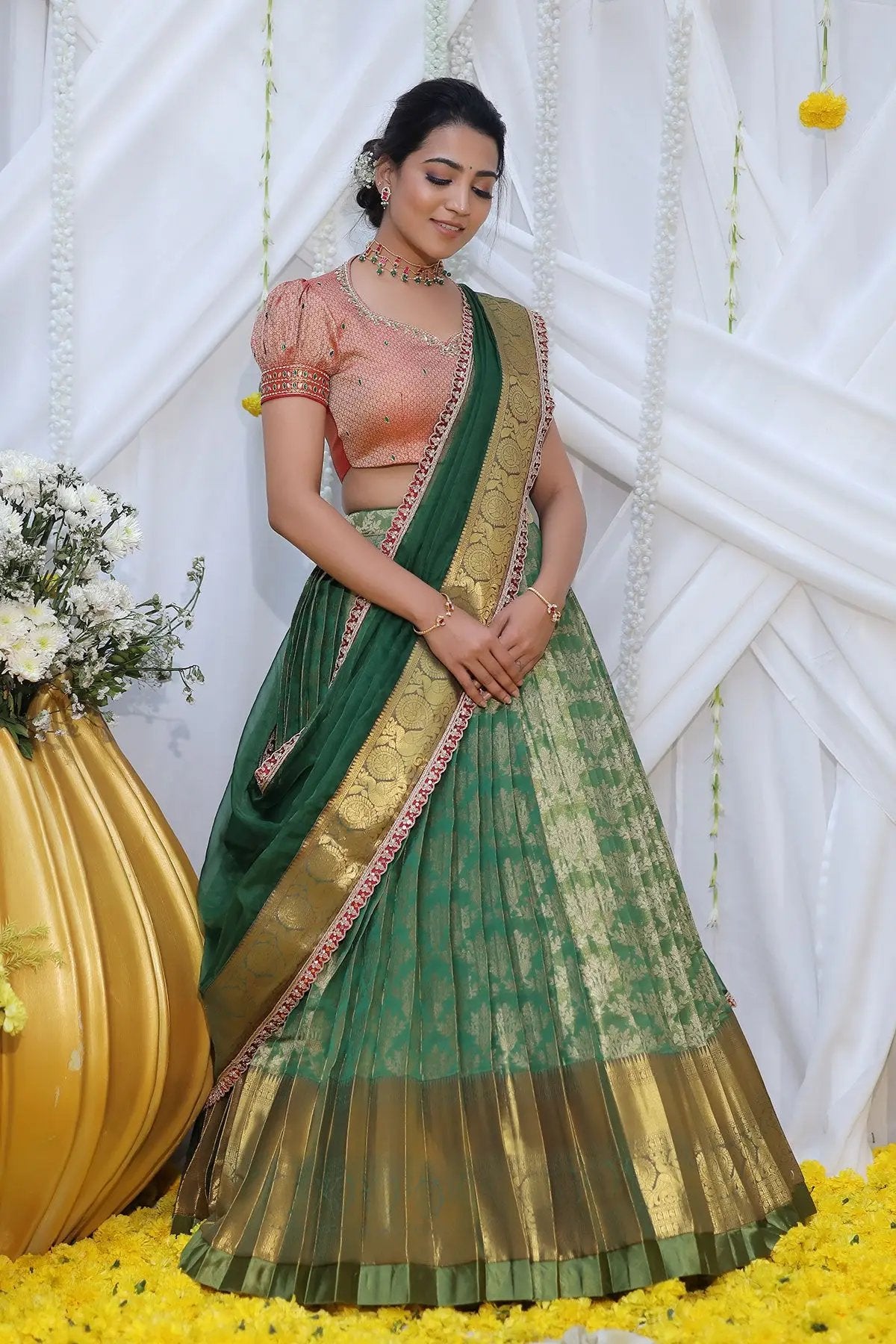 a woman in green Vahini Banarasi Lehenga Set - Bullionknot