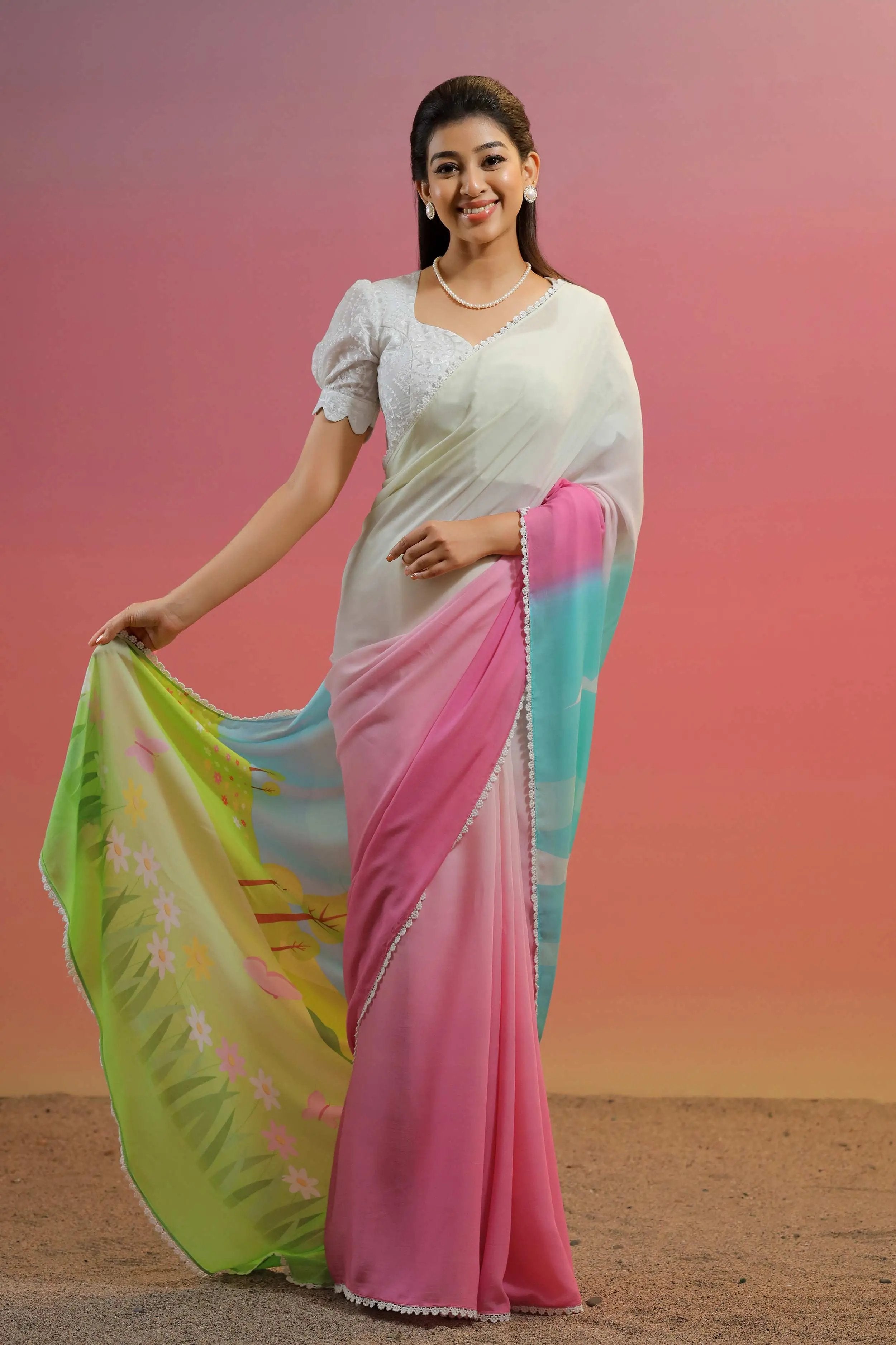 a woman in pink and white cotton saree