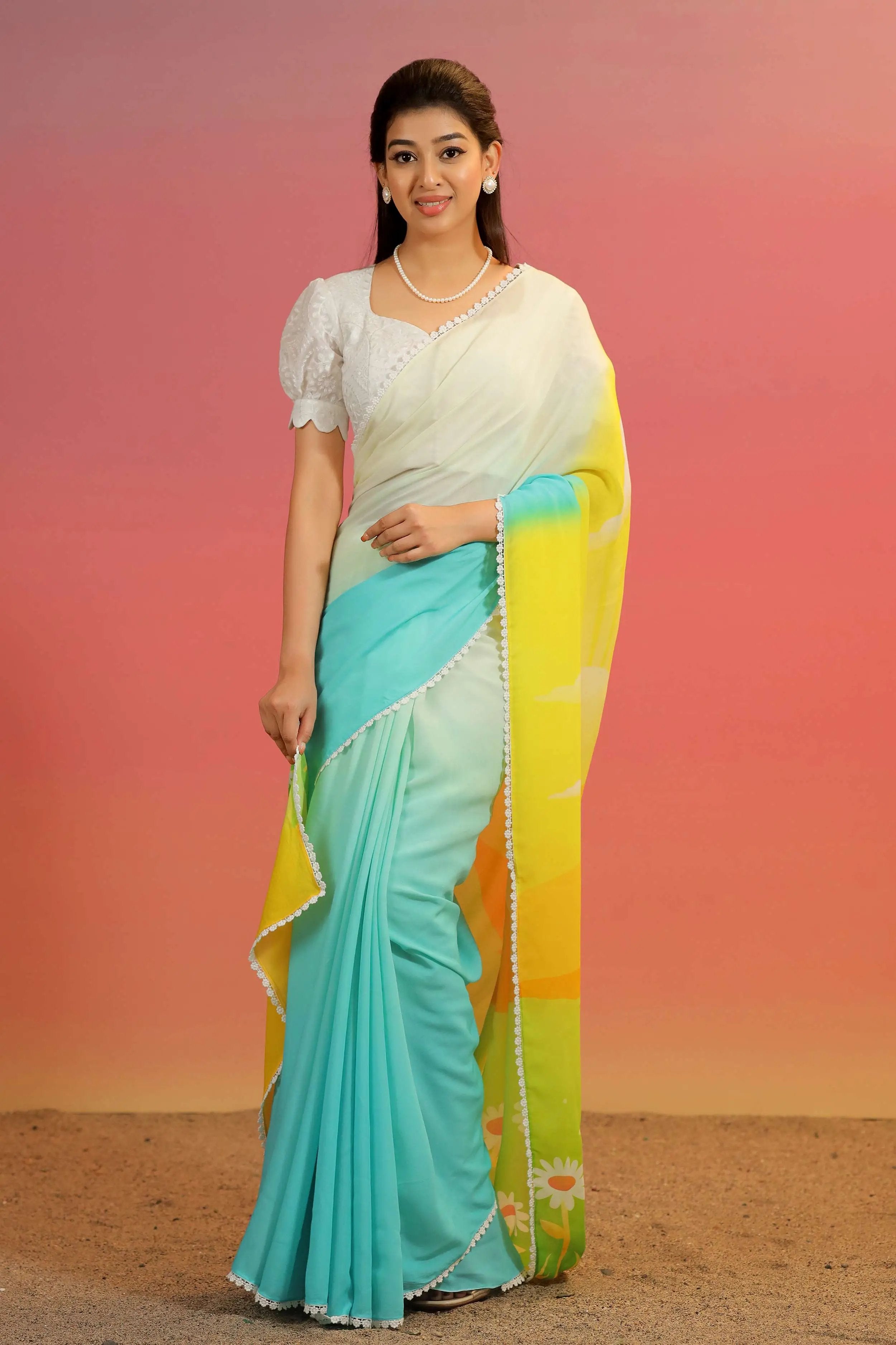 a woman in cotton gerogette sky blue and white Varada Saree - Bullionknot