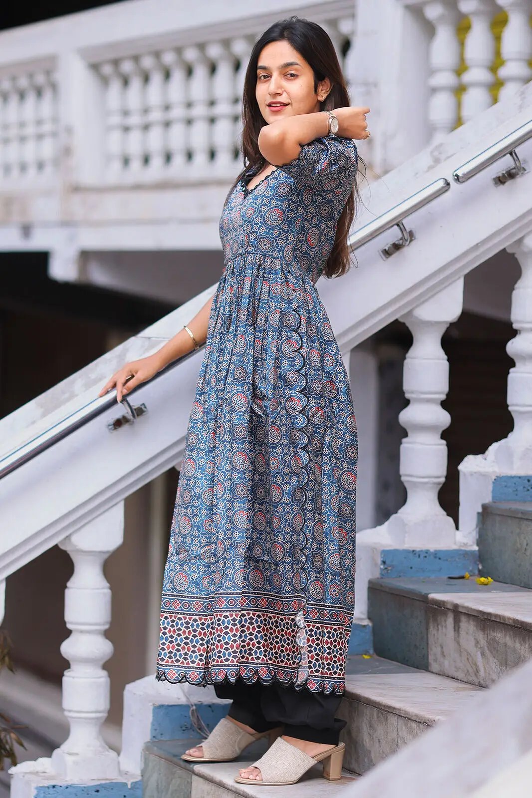 Yashna Ajarakh Kurta Set, model adjusting hair