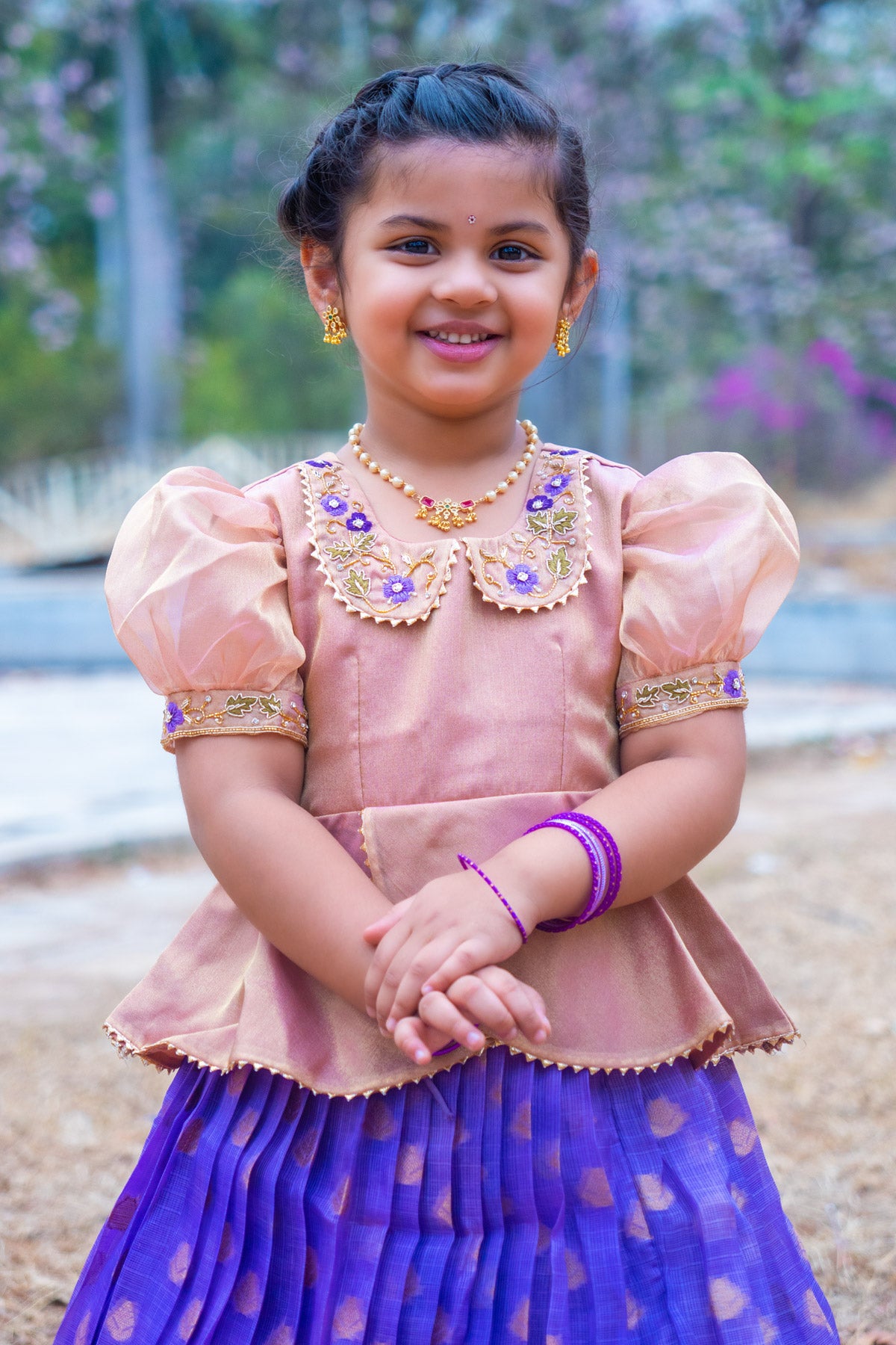 Close-up of Baby Diva Lehenga Set with floral details