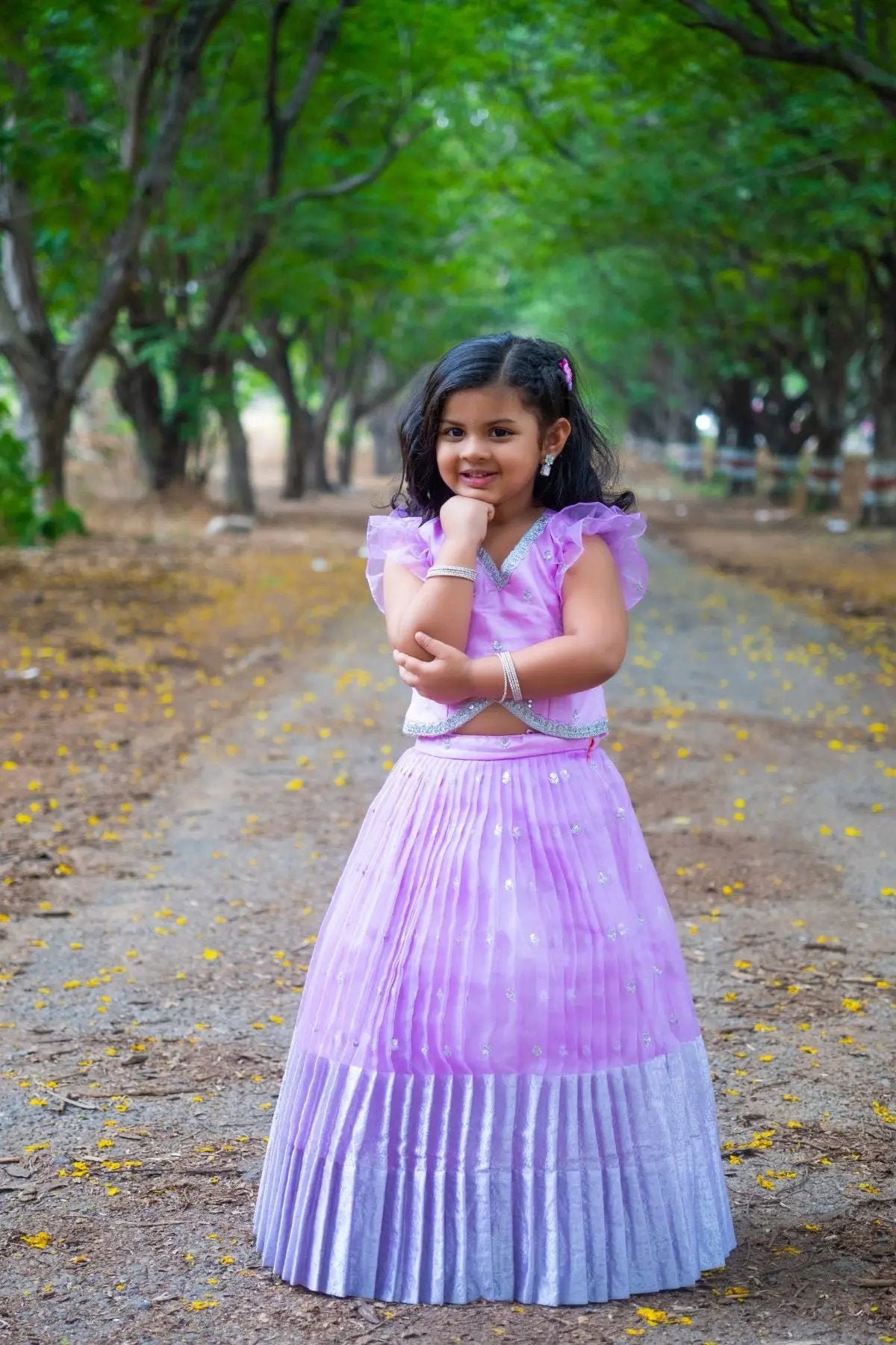 Young girl posing in lavender Baby Siddhi Lehenga Set