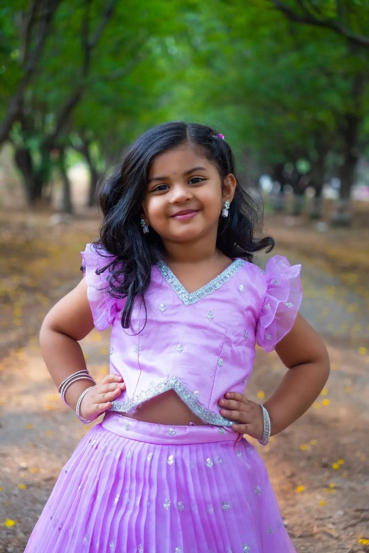 Girl in lavender Baby Siddhi Lehenga Set smiling outdoors