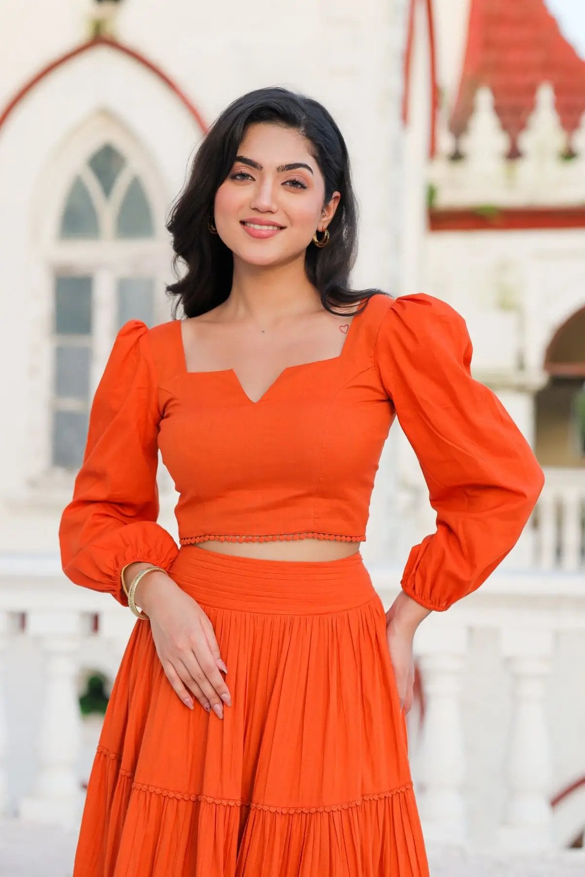 Elegant orange lehenga with puff sleeves