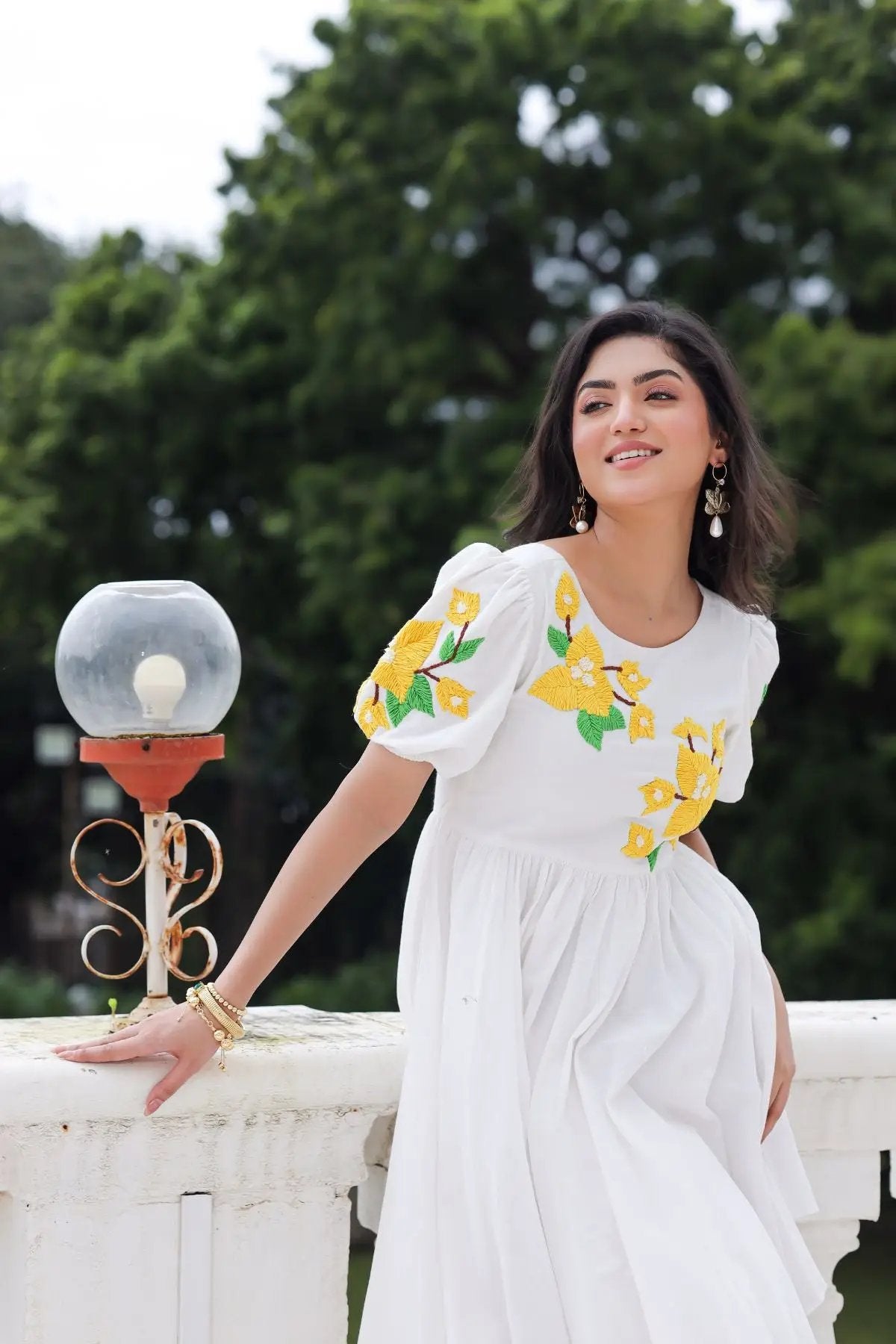 White Marigold Maxi Dress with floral embroidery, side view