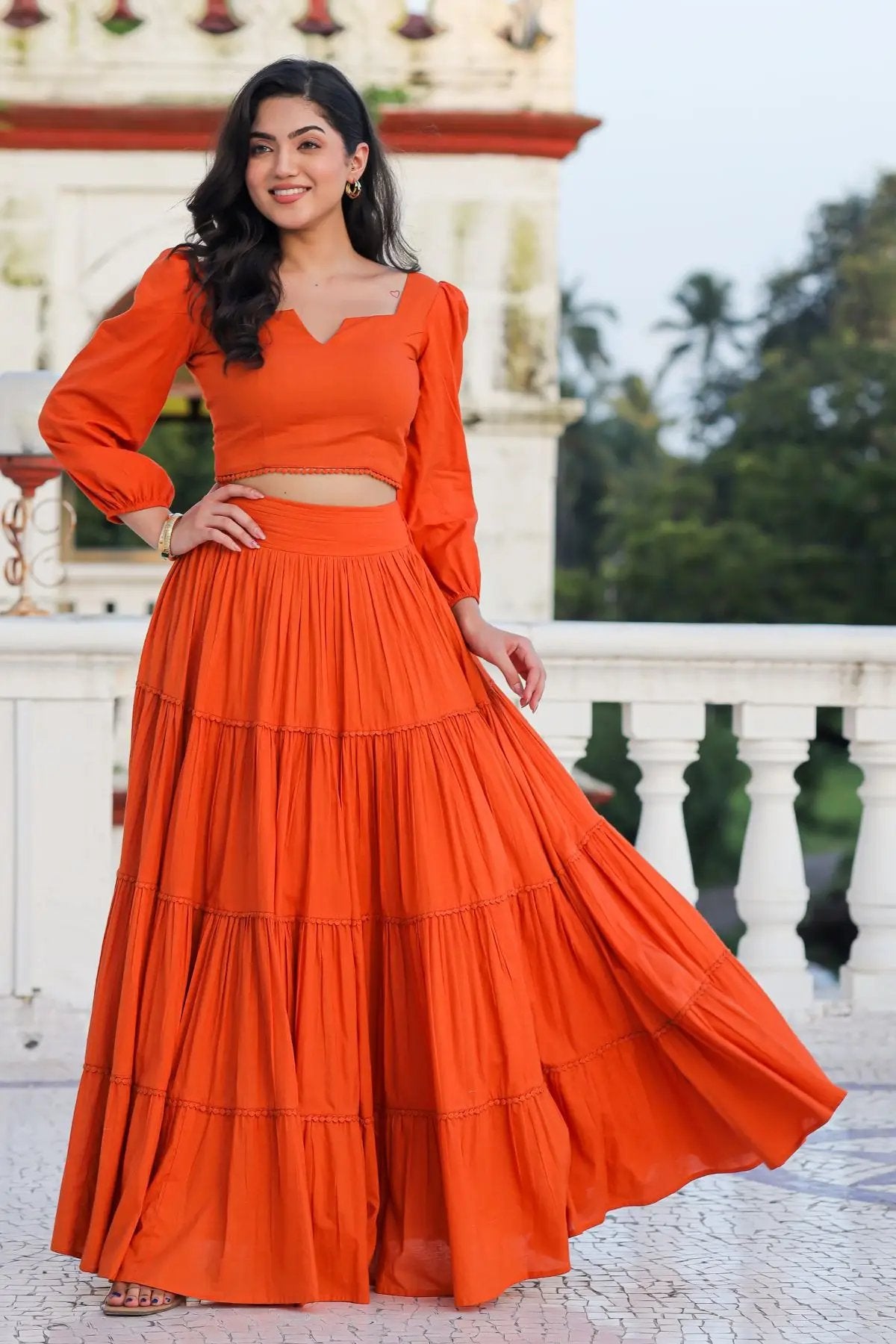 Orange crop top set lehenga with long sleeves