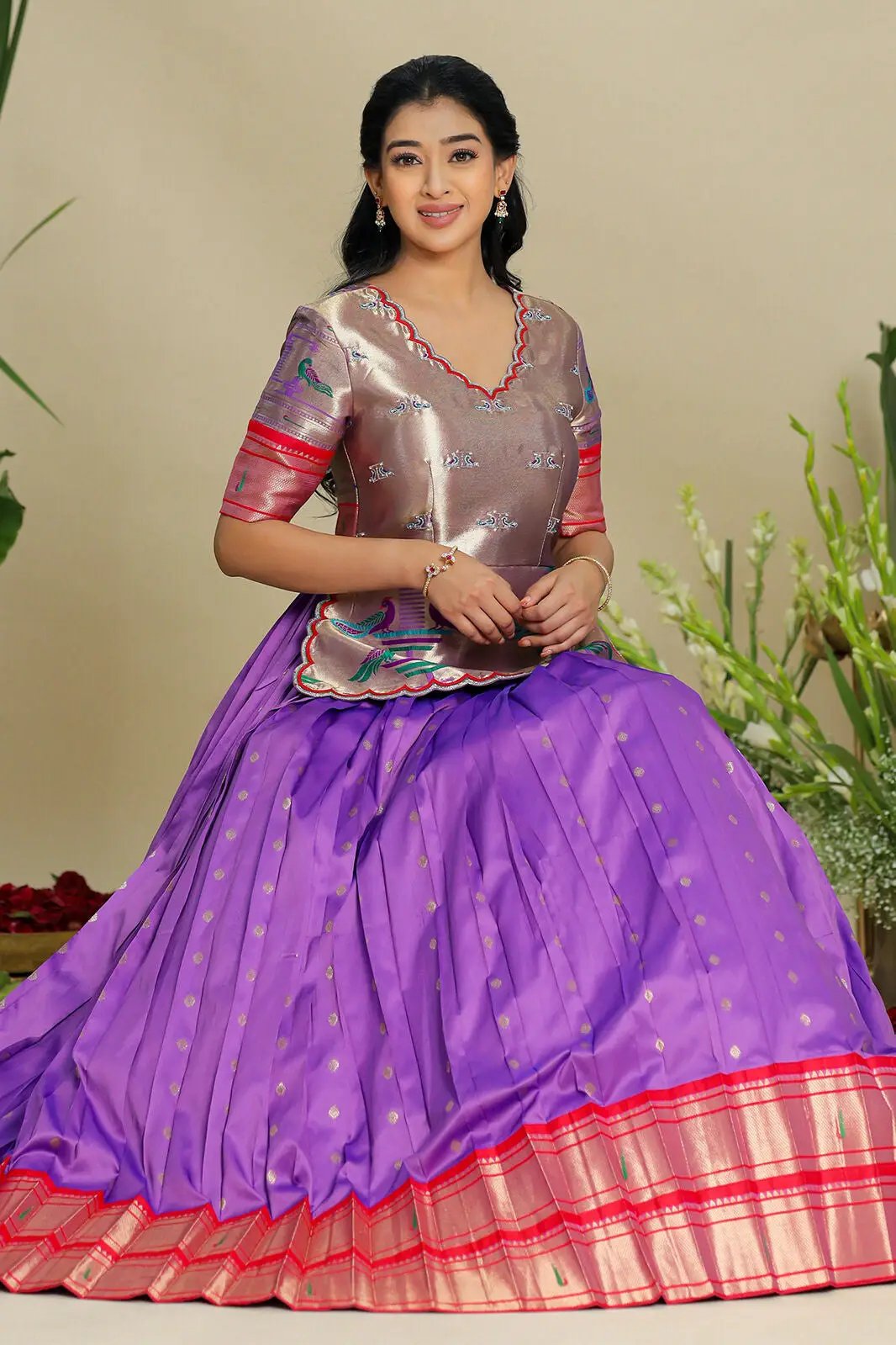 Elegant pastel purple Banarasi dress seated view