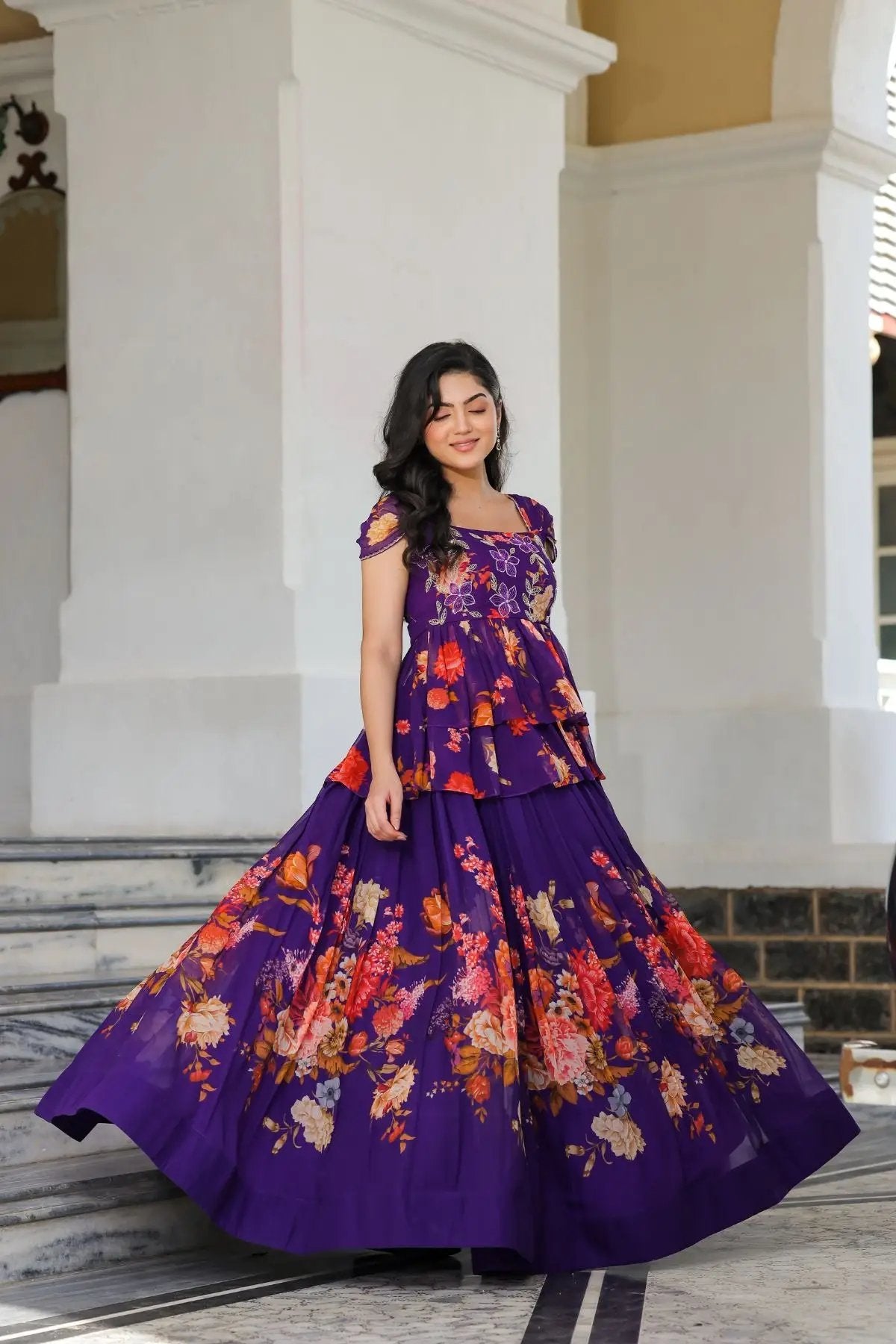 Flowing purple ethnic dress with colorful floral print